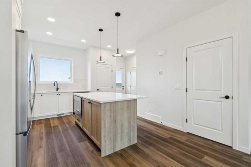 49 Bluerock Hill Sw, Calgary, AB - Indoor Photo Showing Kitchen