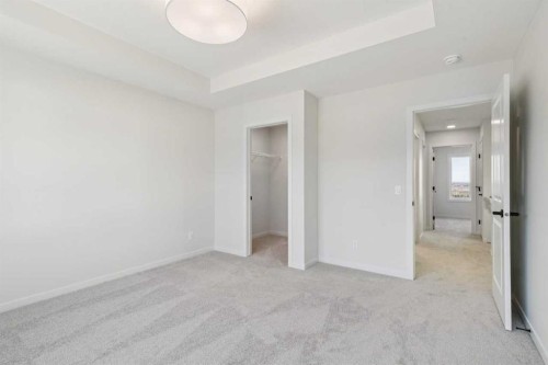 49 Bluerock Hill Sw, Calgary, AB - Indoor Photo Showing Other Room