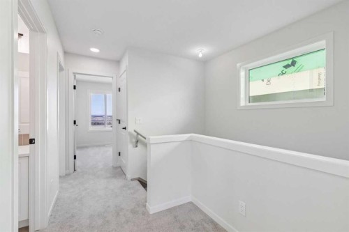 49 Bluerock Hill Sw, Calgary, AB - Indoor Photo Showing Other Room