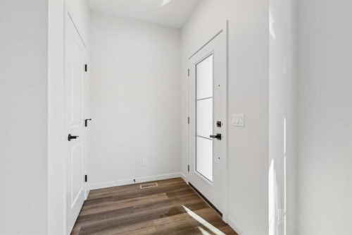 49 Bluerock Hill Sw, Calgary, AB - Indoor Photo Showing Other Room