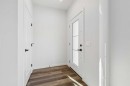 49 Bluerock Hill Sw, Calgary, AB  - Indoor Photo Showing Other Room 