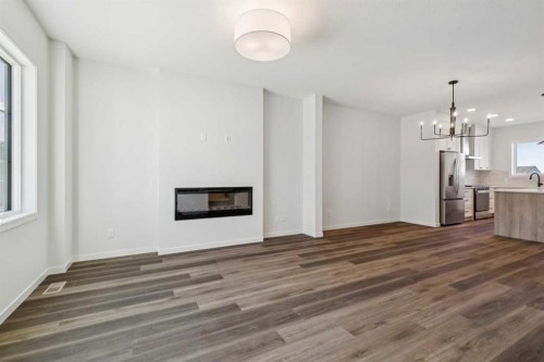 49 Bluerock Hill Sw, Calgary, AB - Indoor With Fireplace