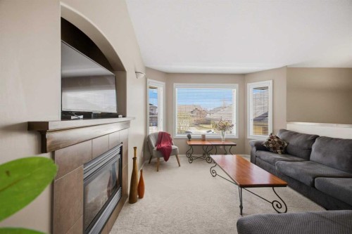 135 Issard Close, Red Deer, AB - Indoor Photo Showing Living Room With Fireplace