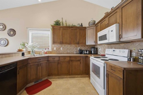135 Issard Close, Red Deer, AB - Indoor Photo Showing Kitchen With Double Sink