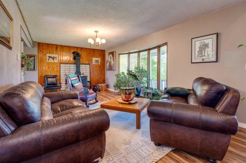 37533 Range Road 241, Rural Red Deer County, AB - Indoor Photo Showing Living Room With Fireplace
