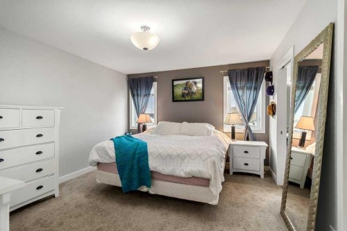 59 Reynolds Road, Sylvan Lake, AB - Indoor Photo Showing Bedroom