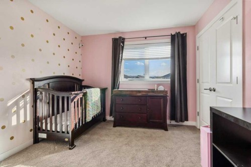 59 Reynolds Road, Sylvan Lake, AB - Indoor Photo Showing Bedroom