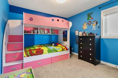 59 Reynolds Road, Sylvan Lake, AB - Indoor Photo Showing Bedroom