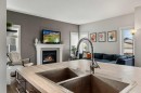 59 Reynolds Road, Sylvan Lake, AB  - Indoor With Fireplace 