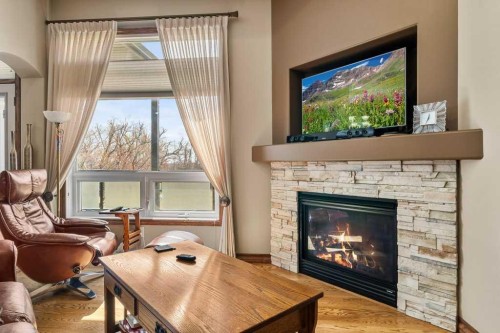 40 Oakwood Close, Red Deer, AB - Indoor Photo Showing Living Room With Fireplace