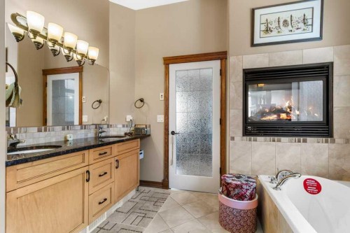 40 Oakwood Close, Red Deer, AB - Indoor Photo Showing Bathroom With Fireplace