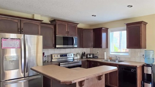 5837 Park Street, Blackfalds, AB - Indoor Photo Showing Kitchen With Stainless Steel Kitchen With Double Sink
