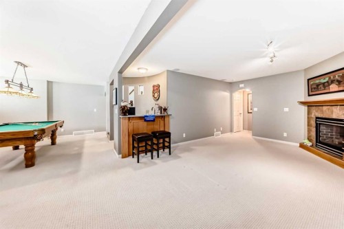 70 Abraham Close, Red Deer, AB - Indoor Photo Showing Other Room With Fireplace