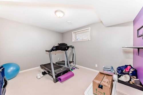 70 Abraham Close, Red Deer, AB - Indoor Photo Showing Gym Room