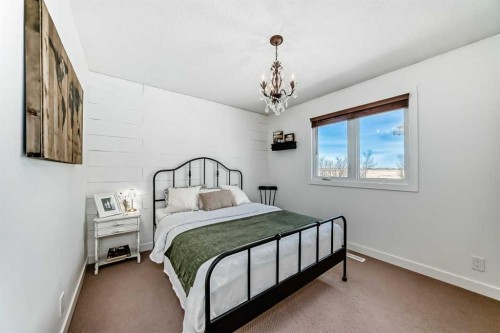 302064 Range Road, Linden, AB - Indoor Photo Showing Bedroom
