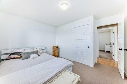 302064 Range Road, Linden, AB - Indoor Photo Showing Bedroom