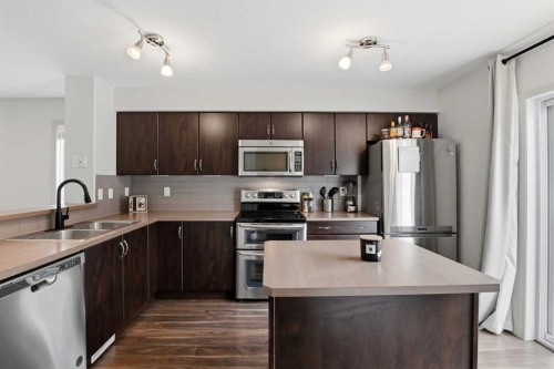 1906-30 Carleton Avenue, Red Deer, AB - Indoor Photo Showing Kitchen With Stainless Steel Kitchen With Double Sink With Upgraded Kitchen
