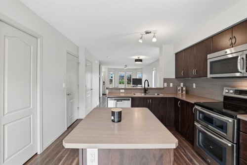 1906-30 Carleton Avenue, Red Deer, AB - Indoor Photo Showing Kitchen With Stainless Steel Kitchen With Double Sink With Upgraded Kitchen