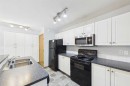 40-20 Jacobs Close, Red Deer, AB  - Indoor Photo Showing Kitchen With Double Sink 