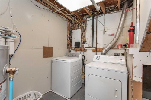 62 Nance Avenue, Red Deer, AB - Indoor Photo Showing Laundry Room