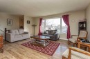 62 Nance Avenue, Red Deer, AB  - Indoor Photo Showing Living Room 