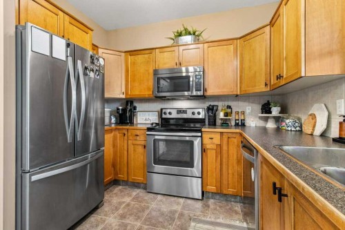 13 Kanten Close, Red Deer, AB - Indoor Photo Showing Kitchen With Double Sink