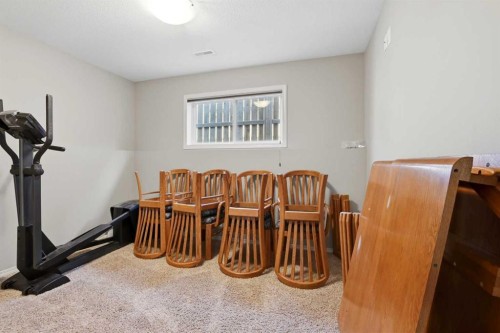 84 Vickers Close, Red Deer, AB - Indoor Photo Showing Gym Room