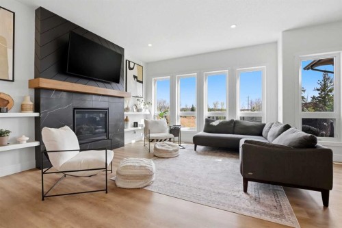223 Ellington Crescent, Red Deer, AB - Indoor Photo Showing Living Room With Fireplace