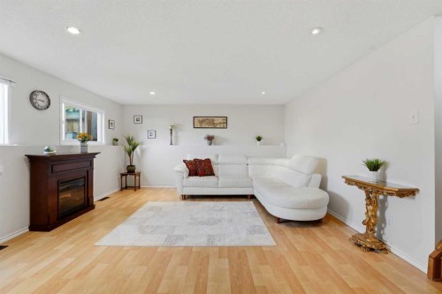 35 Ray Avenue, Red Deer, AB - Indoor Photo Showing Living Room With Fireplace