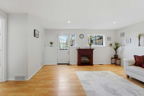 35 Ray Avenue, Red Deer, AB - Indoor Photo Showing Living Room With Fireplace