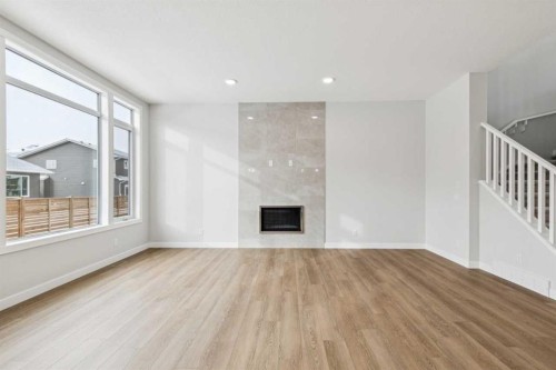261 Dawson Wharf Crescent, Chestermere, AB - Indoor With Fireplace
