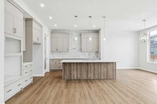 261 Dawson Wharf Crescent, Chestermere, AB - Indoor Photo Showing Kitchen With Upgraded Kitchen