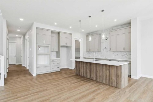 261 Dawson Wharf Crescent, Chestermere, AB - Indoor Photo Showing Kitchen With Upgraded Kitchen