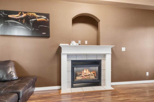 5509 Panorama Drive, Blackfalds, AB - Indoor Photo Showing Living Room With Fireplace