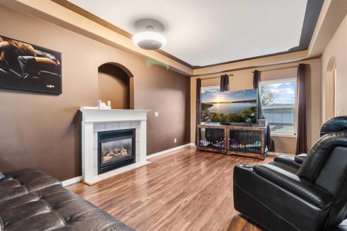 5509 Panorama Drive, Blackfalds, AB - Indoor Photo Showing Living Room With Fireplace