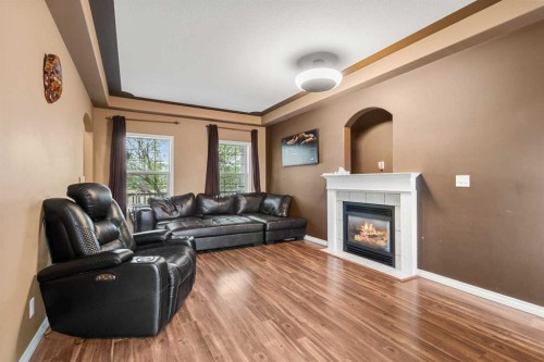 5509 Panorama Drive, Blackfalds, AB - Indoor Photo Showing Living Room With Fireplace