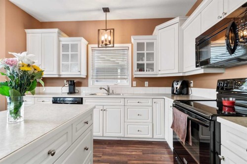 5509 Panorama Drive, Blackfalds, AB - Indoor Photo Showing Kitchen With Double Sink