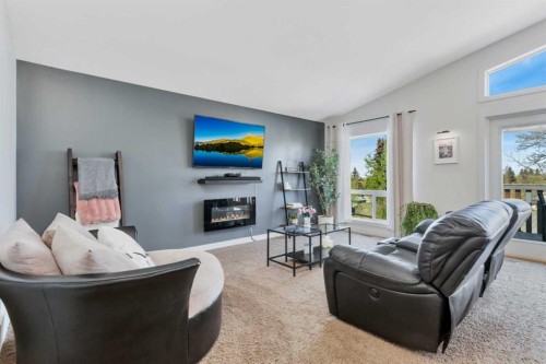 149 Bowman Circle, Sylvan Lake, AB - Indoor Photo Showing Living Room With Fireplace