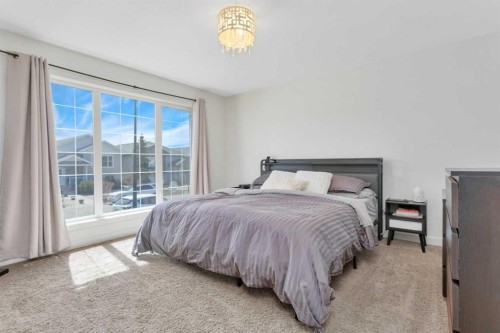149 Bowman Circle, Sylvan Lake, AB - Indoor Photo Showing Bedroom