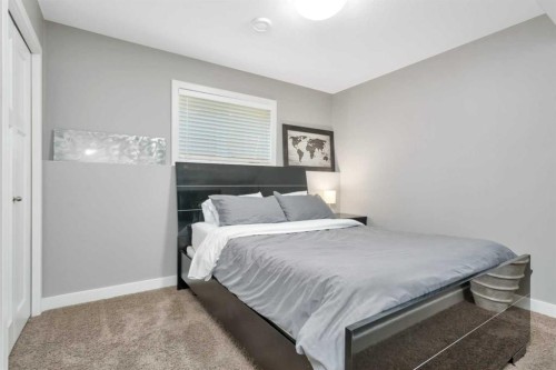 149 Bowman Circle, Sylvan Lake, AB - Indoor Photo Showing Bedroom