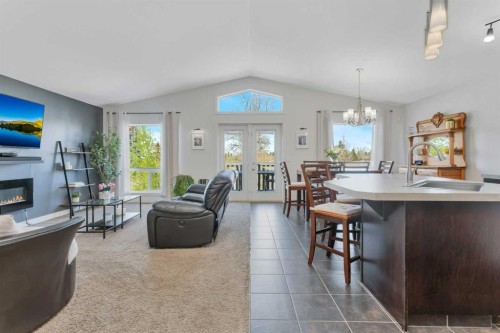 149 Bowman Circle, Sylvan Lake, AB - Indoor Photo Showing Living Room With Fireplace