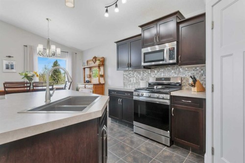 149 Bowman Circle, Sylvan Lake, AB - Indoor Photo Showing Kitchen With Double Sink