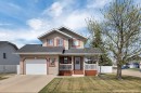 4344 60A Avenue Crescent, Innisfail, AB  - Outdoor With Deck Patio Veranda With Facade 