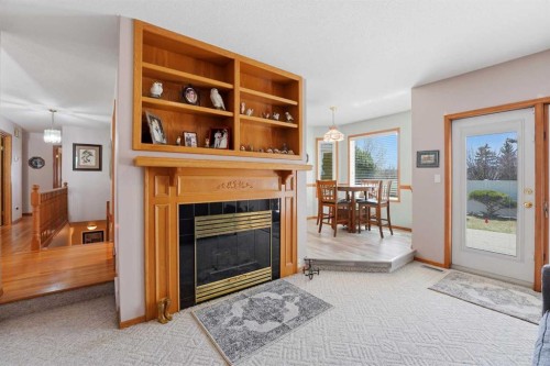 74 Donnelly Crescent, Red Deer, AB - Indoor Photo Showing Living Room With Fireplace