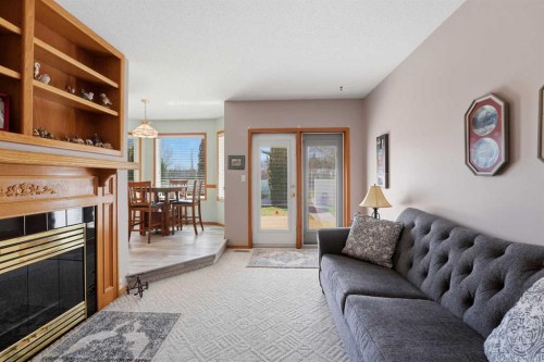 74 Donnelly Crescent, Red Deer, AB - Indoor Photo Showing Living Room With Fireplace