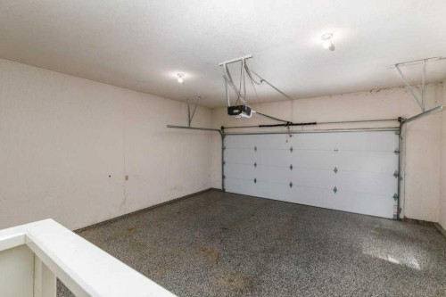 11-4700 Fountain Drive, Red Deer, AB - Indoor Photo Showing Garage