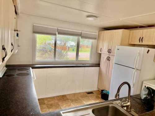 4808 54 Street, Amisk, AB - Indoor Photo Showing Kitchen With Double Sink