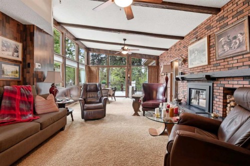 3520 Spruce Drive, Red Deer, AB - Indoor Photo Showing Living Room With Fireplace