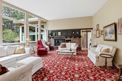 3520 Spruce Drive, Red Deer, AB - Indoor Photo Showing Living Room With Fireplace