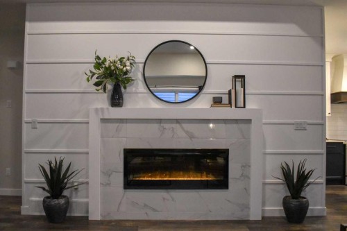 15 Vanson Close, Sylvan Lake, AB - Indoor Photo Showing Living Room With Fireplace